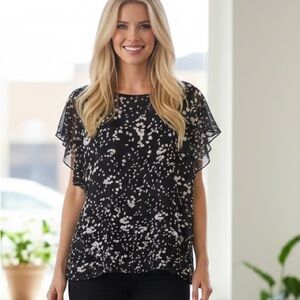 CAbi Black/white flowy‎ top with fitted shell and sheer over layer.